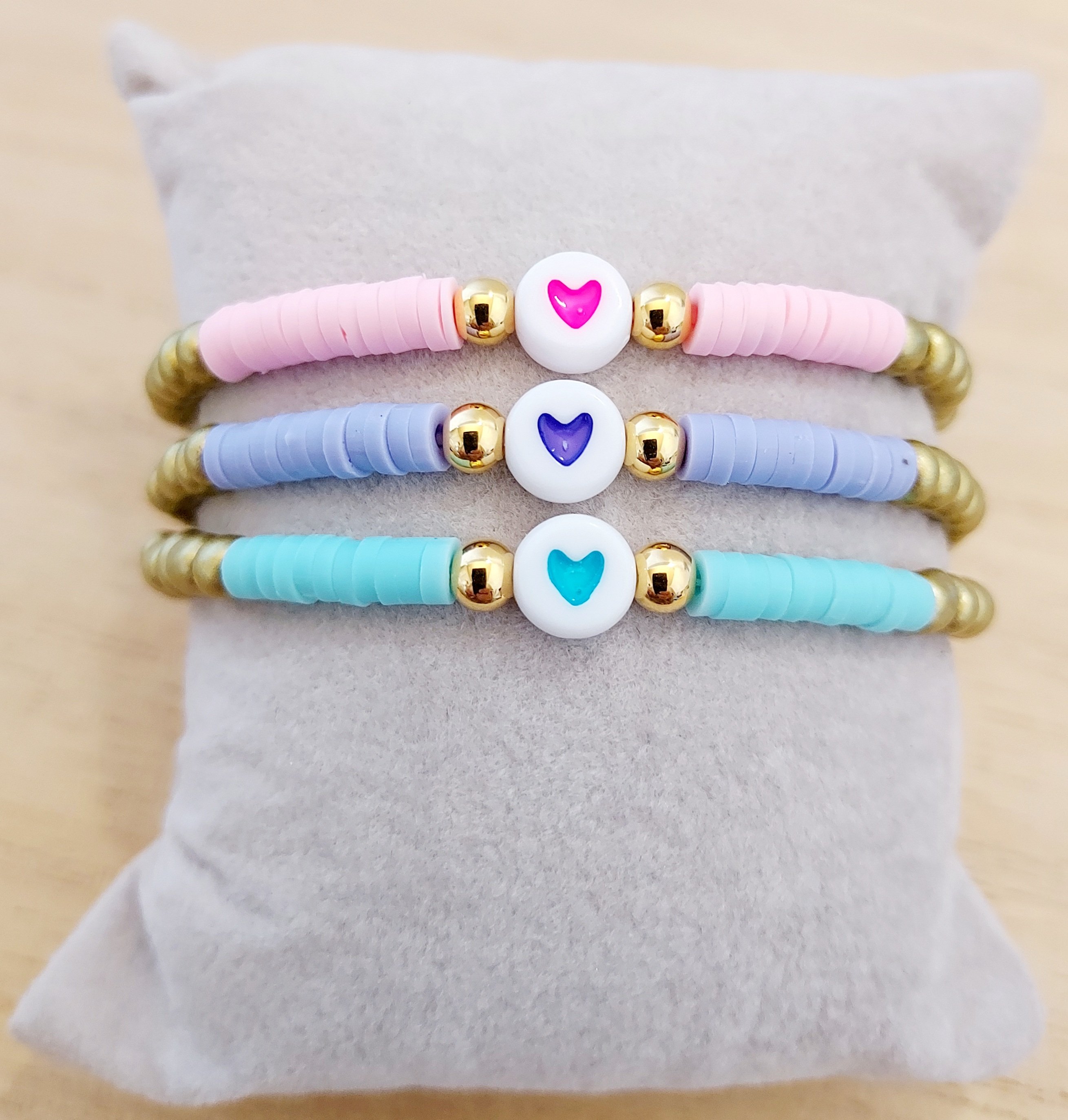 Armb�nd. Pink/Guld