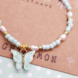 Armbnd med sommerfugl. Lysegrn