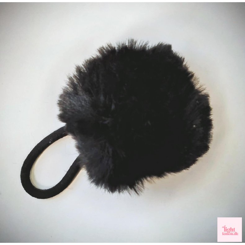 H�relastik med pom pom. Sort