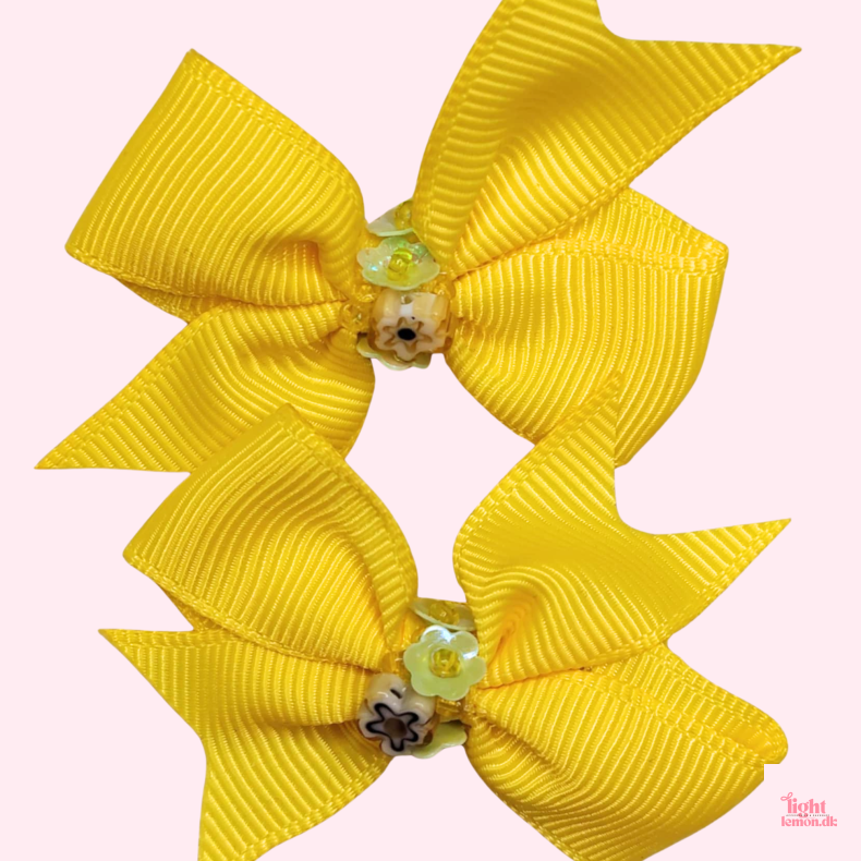 2-pak H�rsp�nder med perler.